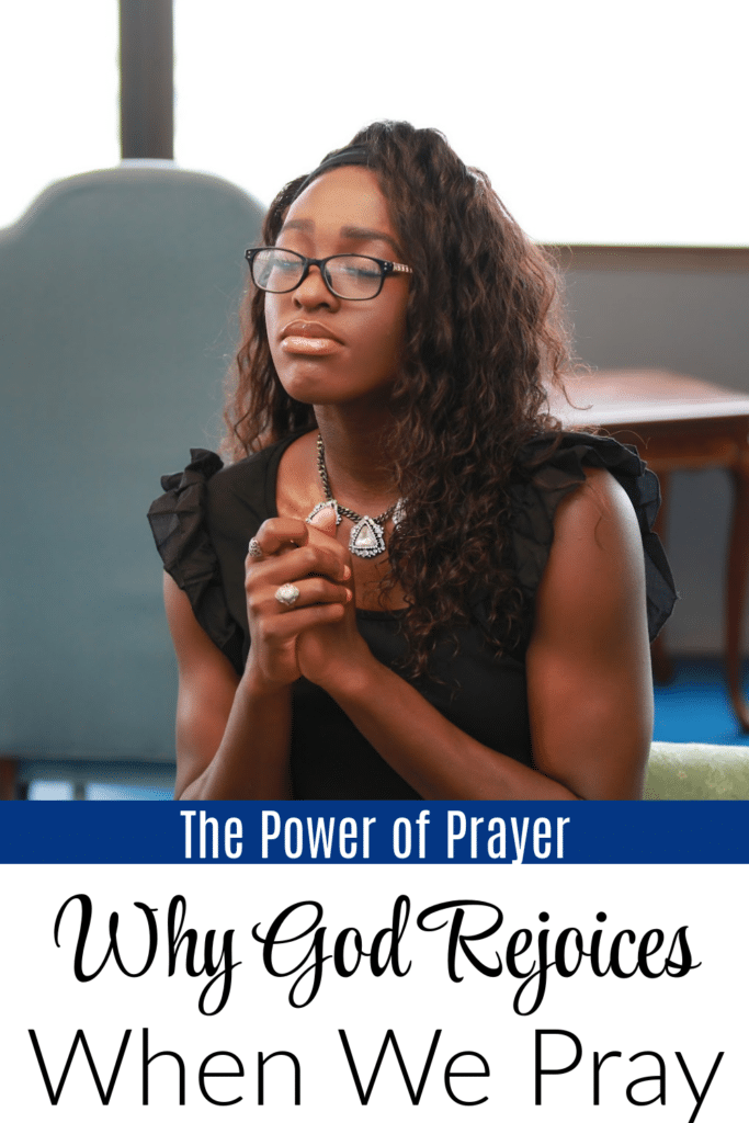 Pictured woman praying by herself in an open room with text overlay "Why God Rejoices When We Pray"